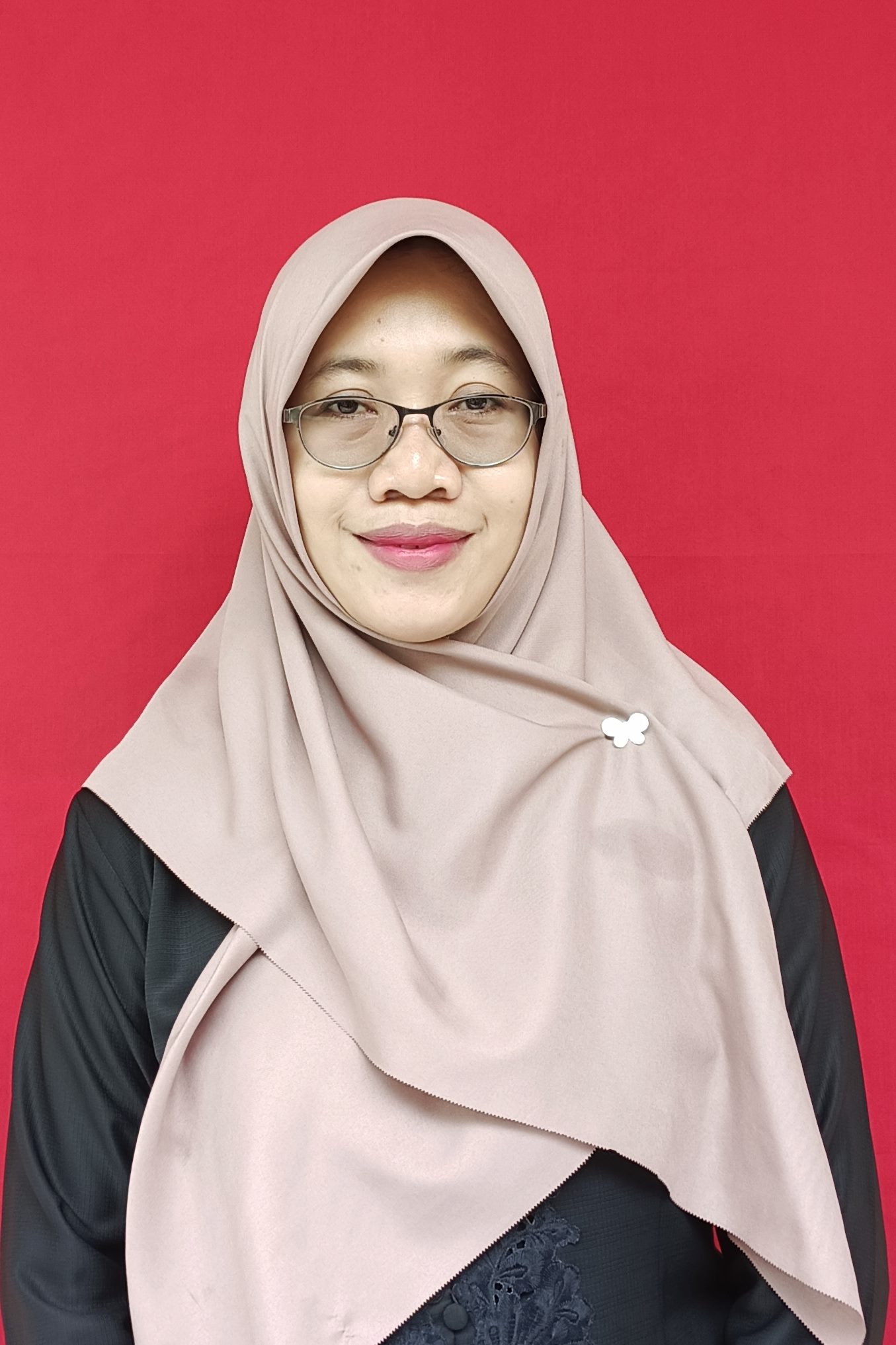 Sri Pujiati, S.I.Pust